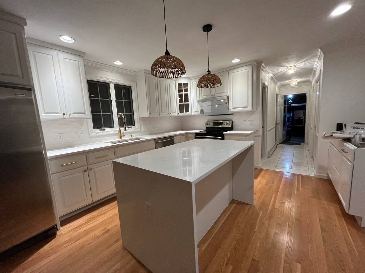 Hopkinton 2023 kitchen: cabinets sanded, primed and painted, new backsplash and hardwood floor