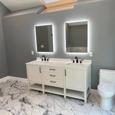 Luxurious Bathroom Renovation with Custom Walk-In Closet