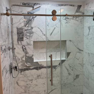 Transformative Bathroom Renovation with Walk-In Shower by Sun Shore Construction