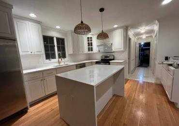 Hopkinton Home Elegance: Chic Half Bath and Dynamic Kitchen Transformation