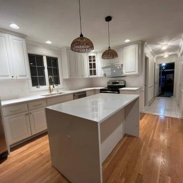 Hopkinton Home Elegance: Chic Half Bath and Dynamic Kitchen Transformation