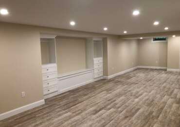 Transformative Basement Finishing with Custom Storage by Sun Shore Construction
