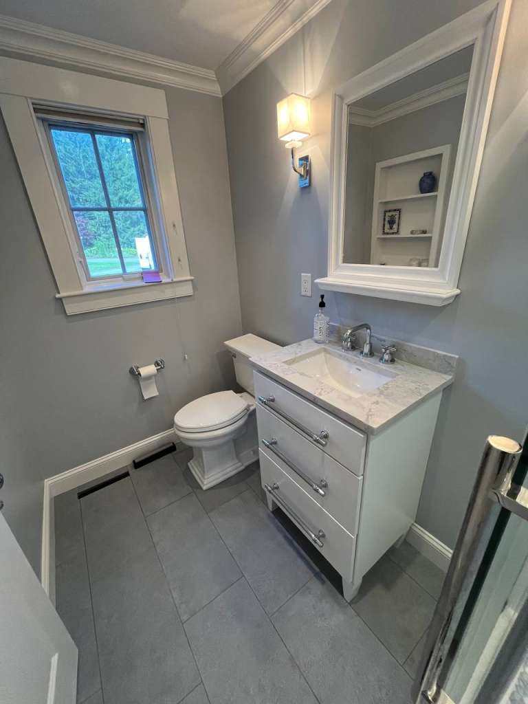 Walk-in shower framing in progress during bathroom renovation in Needham, MA