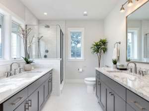 A contractors sketch of a renovated bathroom design showcasing modern appliances and decor.