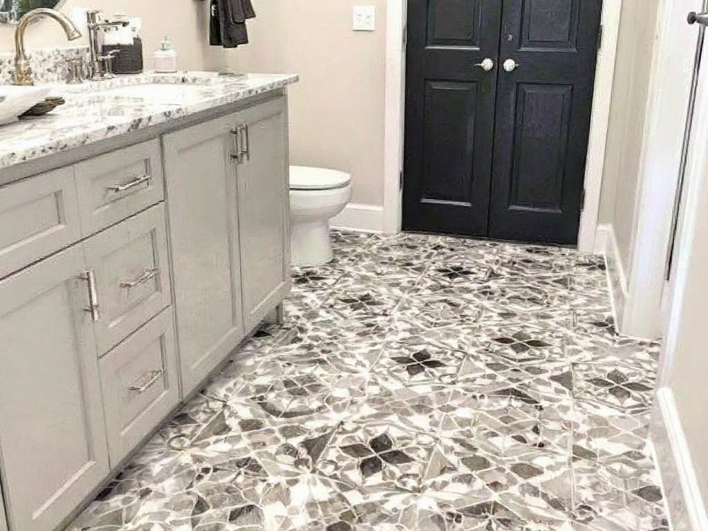 Skilled tile flooring installers implementing a contemporary design in a Waltham, MA property.