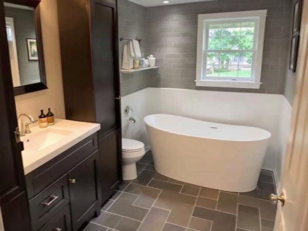 Modern, contemporary designed, freshly coated epoxy Newton MA bathroom transformation.
