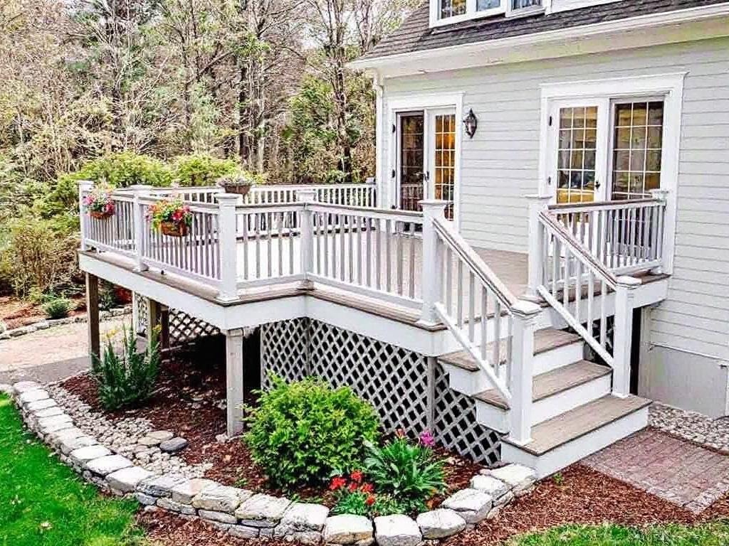 Professional deck construction contractors working on a project near Weston, MA.