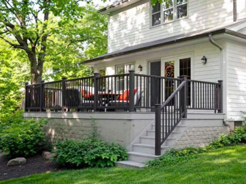 Alt Text: Modern deck porch under construction alongside a freshly remodeled bathroom with contemporary design elements.