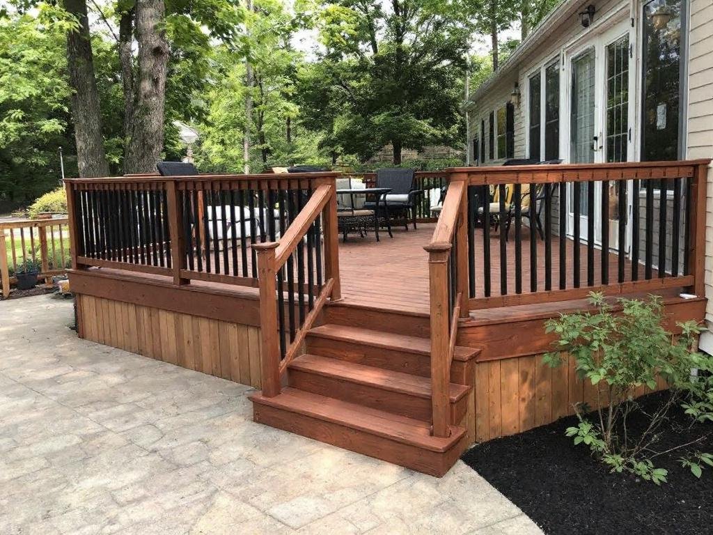 Caption: Unearth Hidden Gems: Deck Builders in Bedford MA showcasing their expertise in delivering the modern, contemporary designs for an ultimate home makeover. Alternative text: A sleek, modern design by deck builders in Bedford MA offering ultimate home makeover solutions.