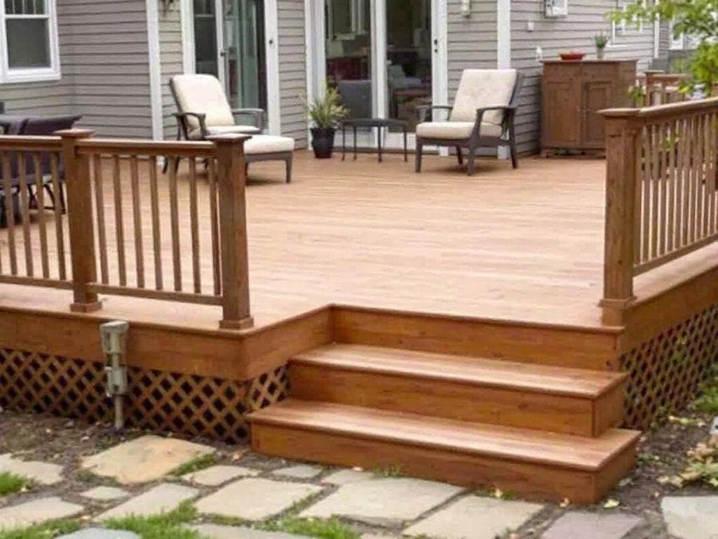 Enhance Your Open-air Leisure Space with Needham, MA's Premier Deck Builders. Expert deck builders constructing an elegant deck in Needham, MA.