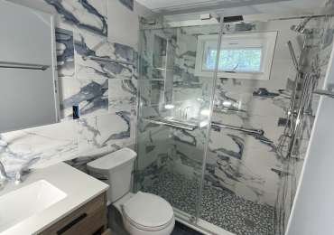 Bathroom Renovation with Laundry Room Addition | Modern Design & Functionality