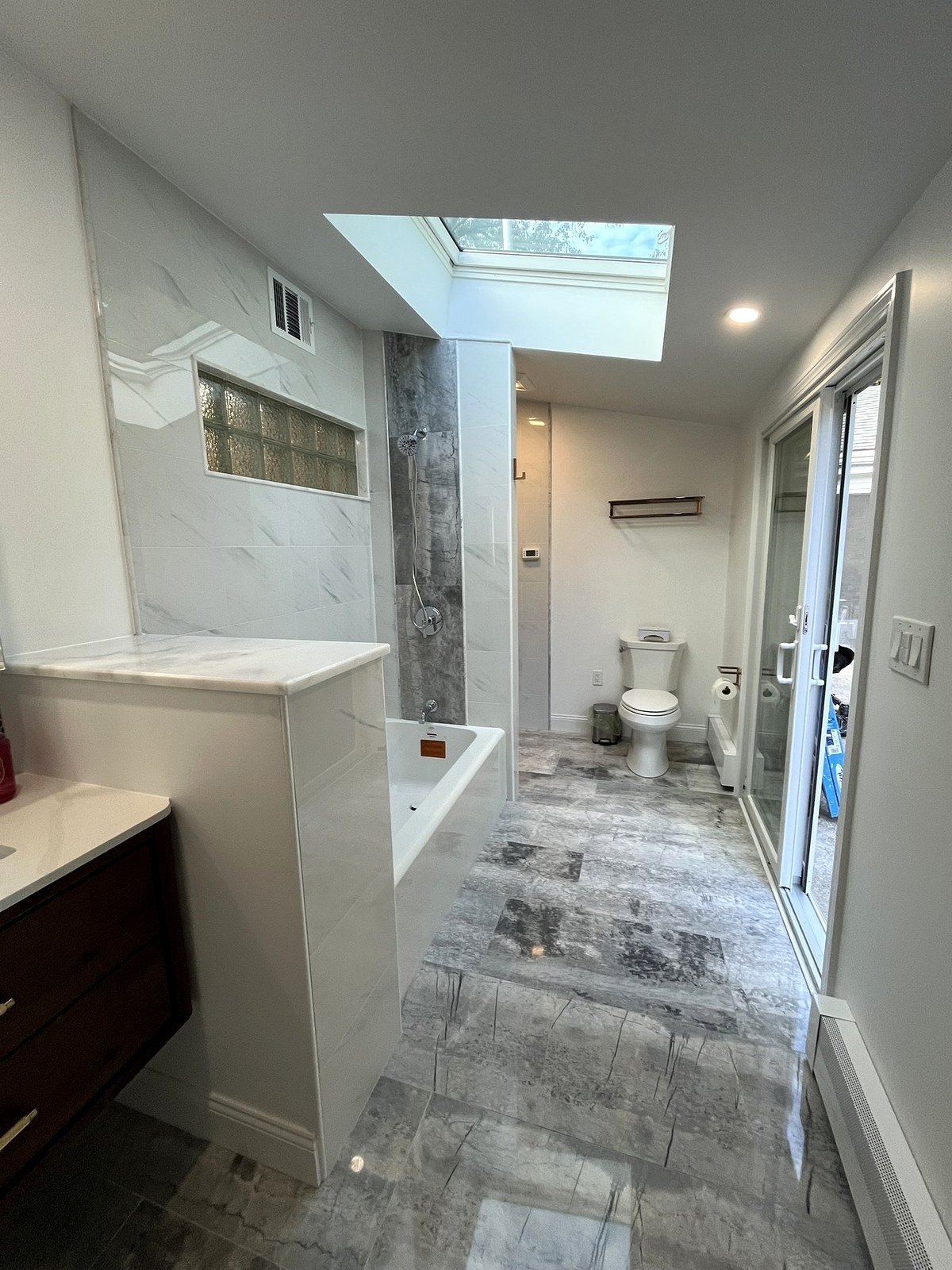 Bathroom renovation Newton MA - 156 Woodcliff Rd master bath with skylight, soaking tub, and walk-in shower