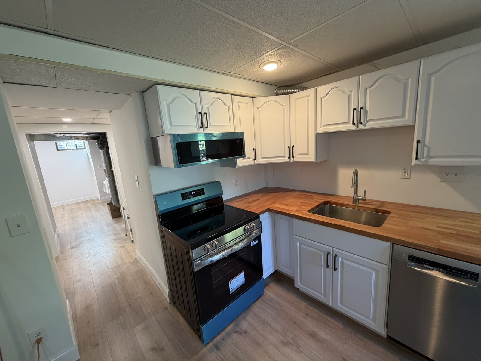Butcher Block Kitchen Remodel in Needham, MA by Sun Shore Construction project photo 2