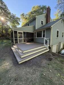 acton-ma-composite-deck-backyard-view Backyard view of new composite deck and screened porch, Acton MA