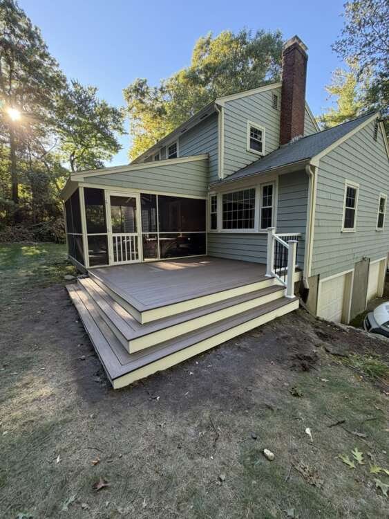 Backyard view of new composite deck and screened porch, Acton MA