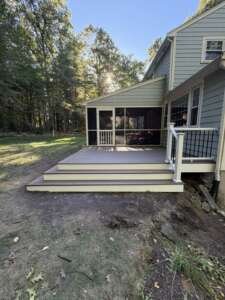 acton-ma-trex-deck-front-view-wide-steps Front view of Trex deck with wide wraparound steps, Acton MA