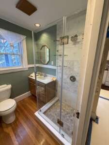 needham-first-floor-bathroom-walk-in-shower-added-in-corner Walk-in shower added in the corner of a first floor bathroom, Needham MA